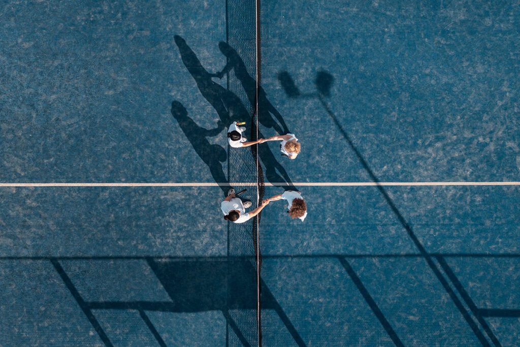 People playing Paddle tennis