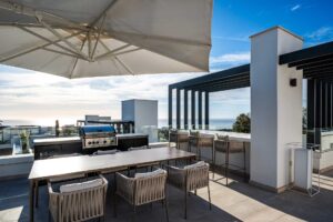 Rooftop terrace (solarium) with jacuzzi, bar, sea and mountain views in Marbella, Spain